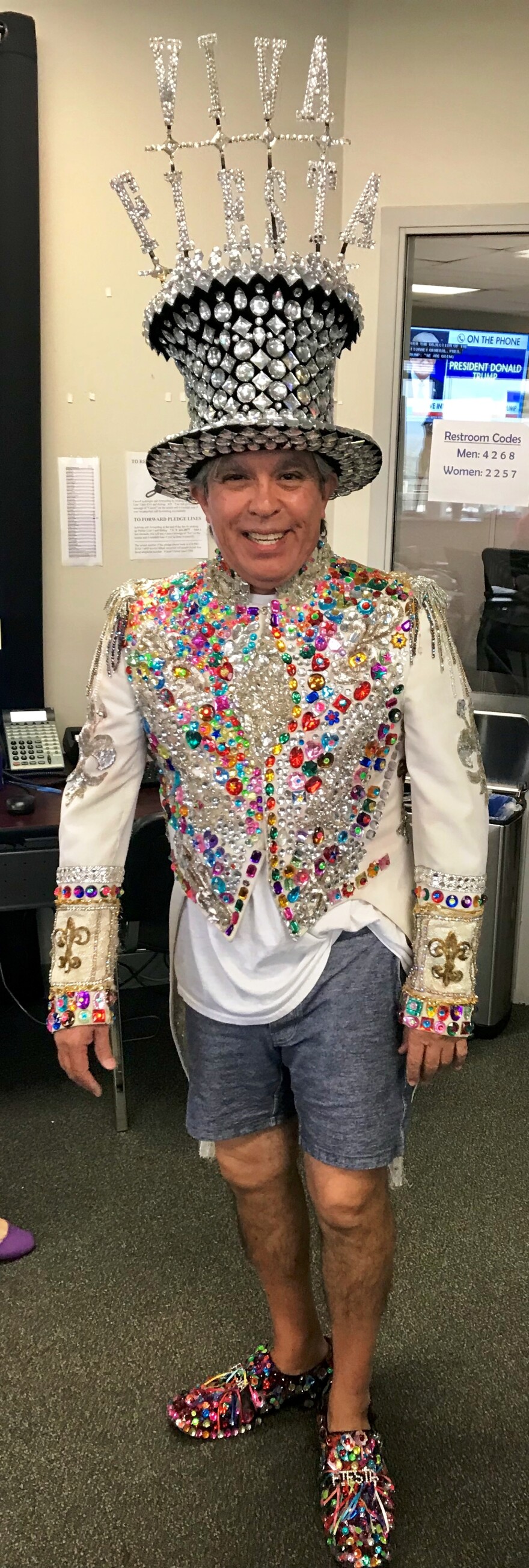 Michael Quintanilla with coat and Viva Fiesta hat
